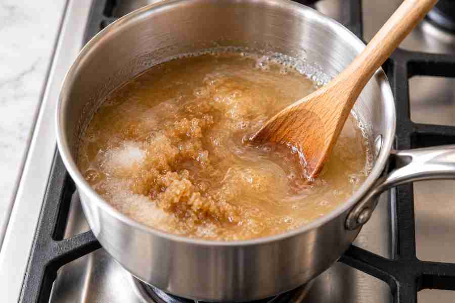 Cinnamon Dolce Syrup: Easy Homemade Coffee Syrup 3 Brown and white sugar dissolving in water for homemade cinnamon dolce syrup