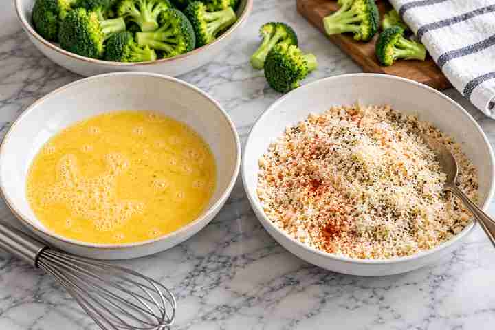 Breaded Broccoli Air Fryer Recipe (Golden & Crispy) 4 Bowls of beaten eggs and seasoned panko Parmesan breadcrumb mixture